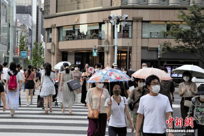 资料图：疫情下的日本东京街头。
/p中新社记者 吕少威 摄